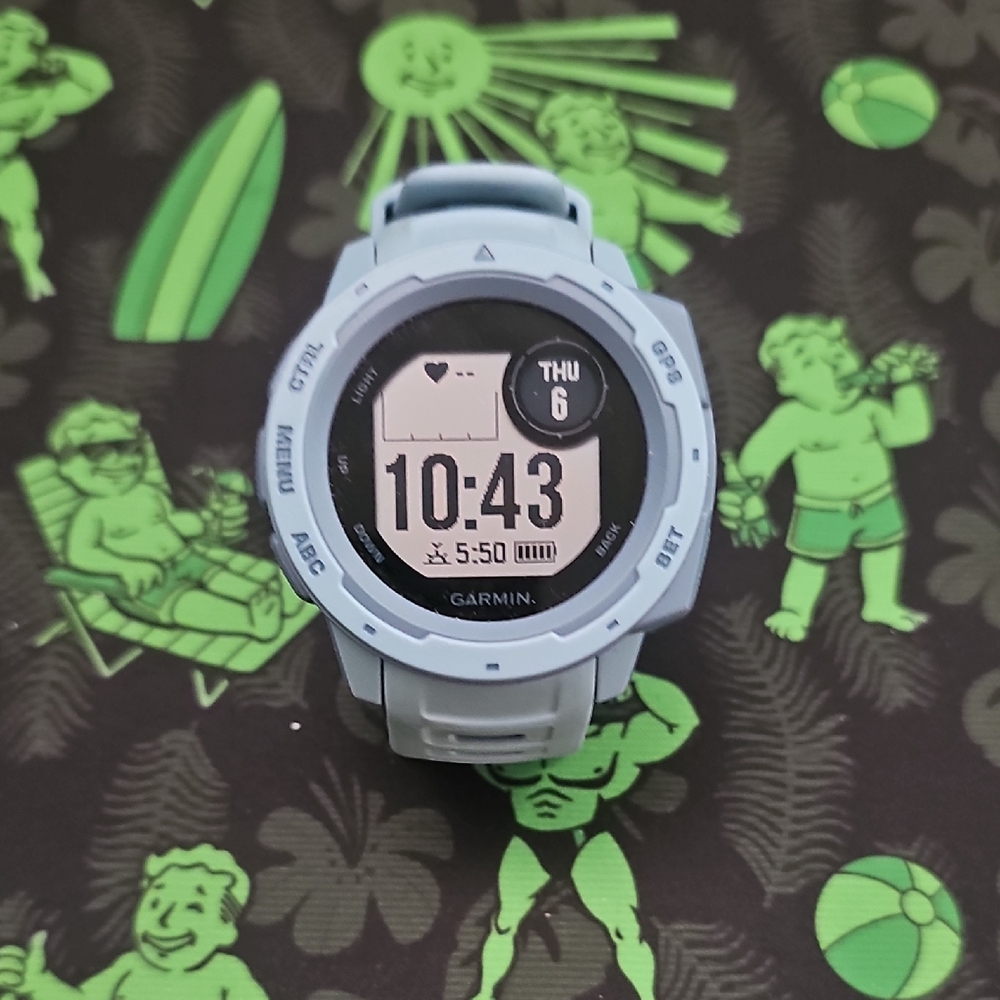 Garmin Instinct Blue Smartwatch with Round Display and Fitness Features